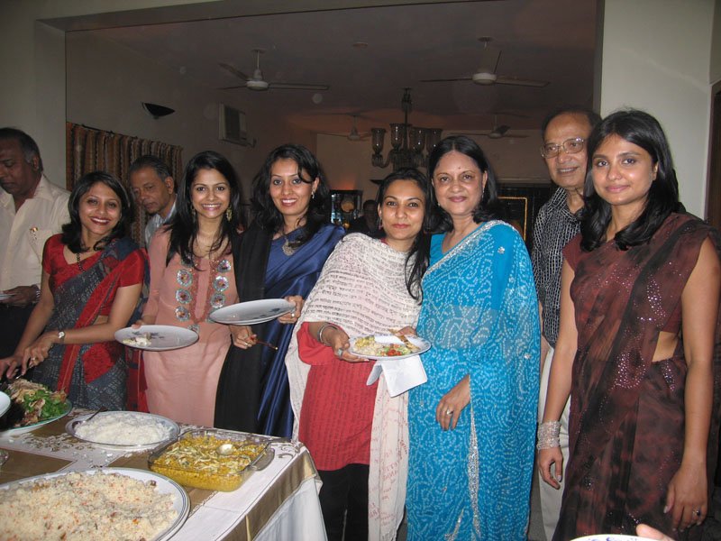 Ammu's (my mom) birthday party at our house. Simat, Nadia, Kimu, Aneela, Ammu, Abbu (my dad), me
