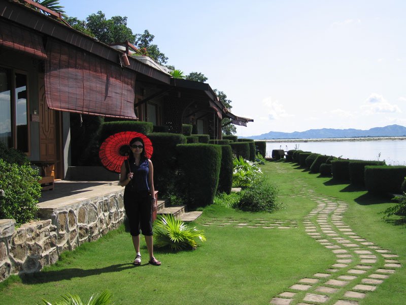 in front of our bungalow. my foot's bandaged up after the motorcycle accident in Mandalay
