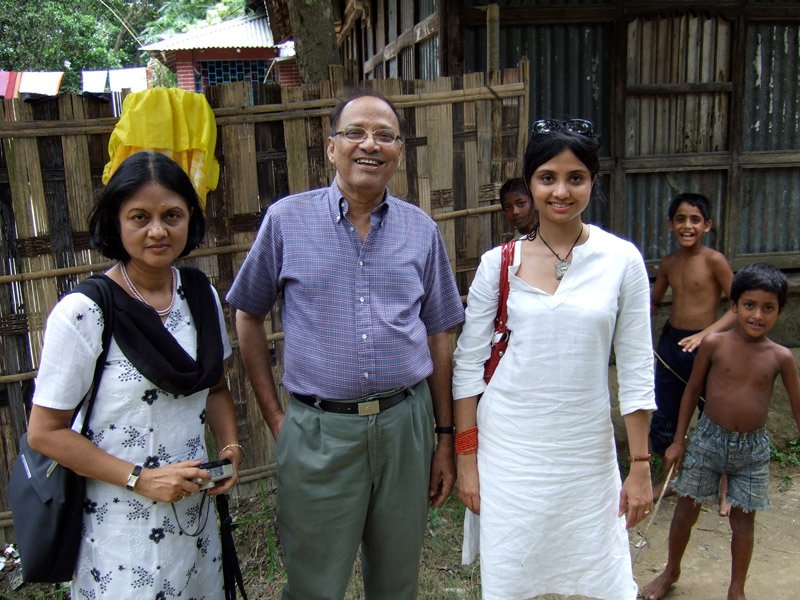 Ammu, Abbu (my dad), and me. we walked around the village and chatted with the people there.  the kids were all very excited to see digital pics of themselves
