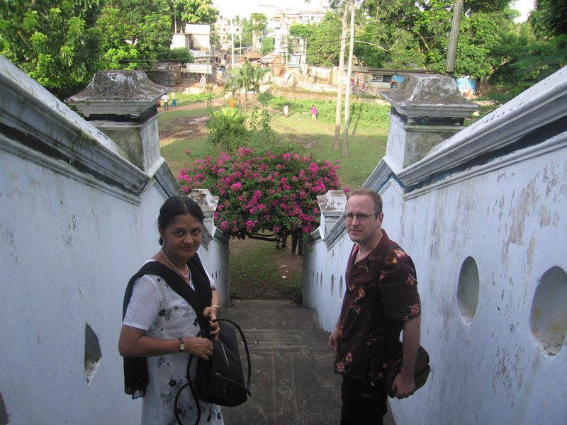 Ammu & Chuck on the steps to the entrance of the house.  there used to be a moat surrounding the lawn (and the pond in the back) around the house.  u can still see the moat, but there's no water in it now
