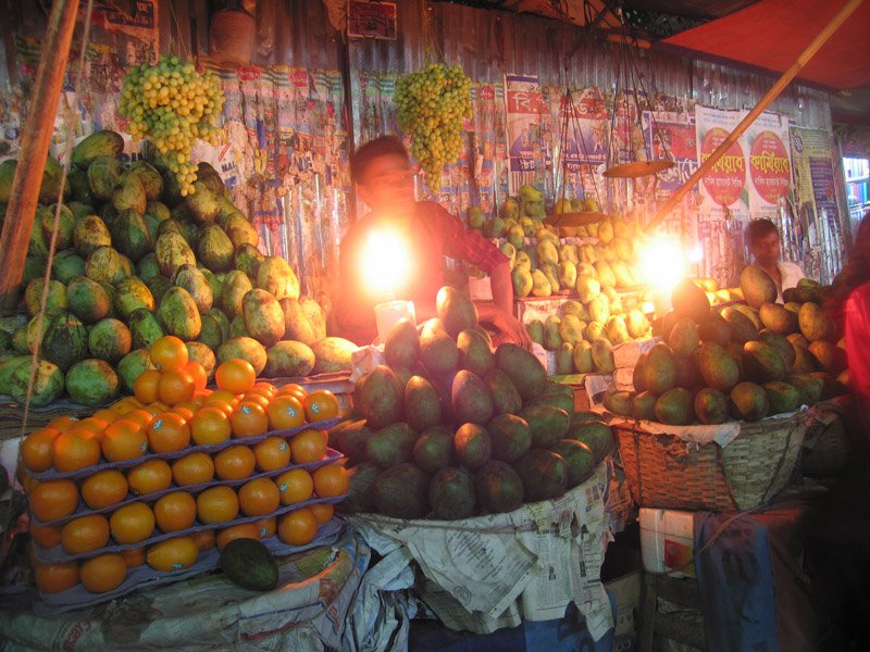 fruit stand with oil lamps
