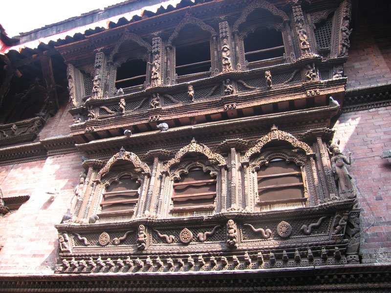 the famous Nepali windows, small wooden intricately carved.

