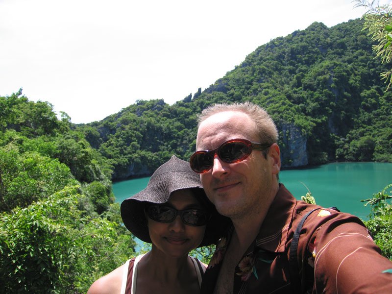 us in front of lagoon in center of island
