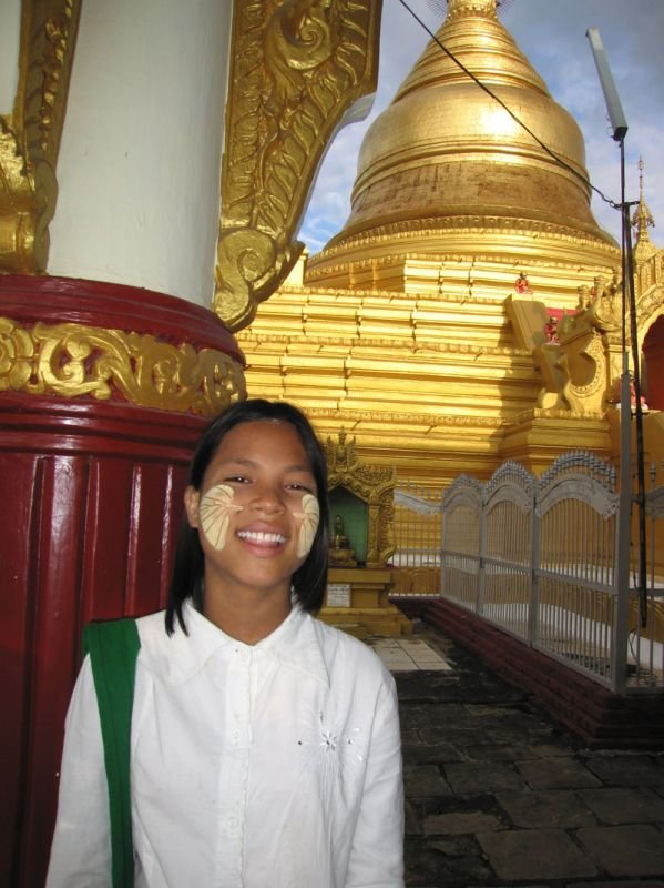 this girl at one of the pagodas had thanaka paste on her face in really cool looking leaf patterns
