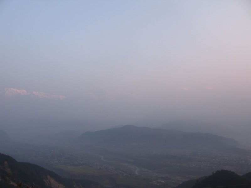 ok, it wasn't quite the religious experience, but watching the himalayas slowly take shape in the foggy sunrise wasn't bad though
