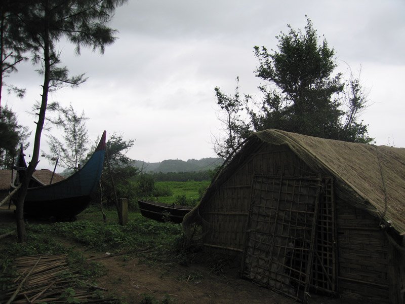 Burmese refugees have settled here on this Bangladesh side of the border. On the way to Teknaf, we passed a few refugee camps. This is not a camp, this is a village. the camps look like refugee camps -hundreds of huts all clustered together w/ UNHCR tarps
