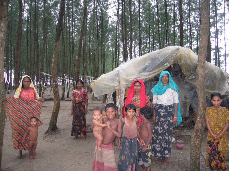 some of the villagers that lived among the trees along the shore. these people are all Burmese and don't speak any Bangla
