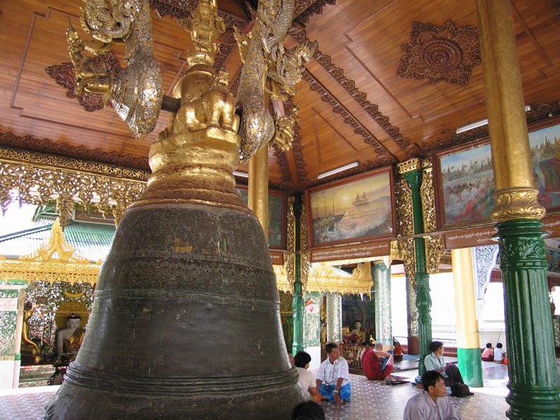 this bell was stolen by the british (they loved looting artifacts). but it sank in the river & they were unable to pull it up.  finally they told the burmese they could have their bell back; the burmese put logs under & floated it
