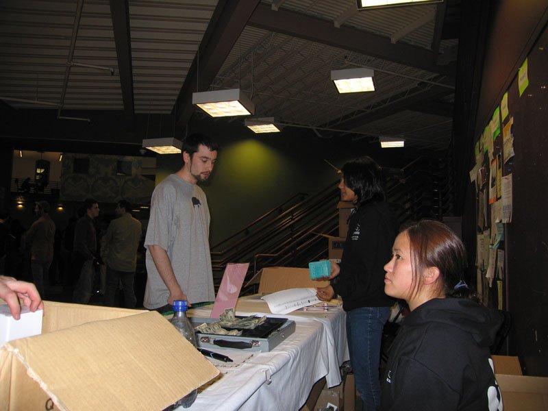 Zaynah & her roommate Lisa selling the sweatshirts to the 200th graduating class
