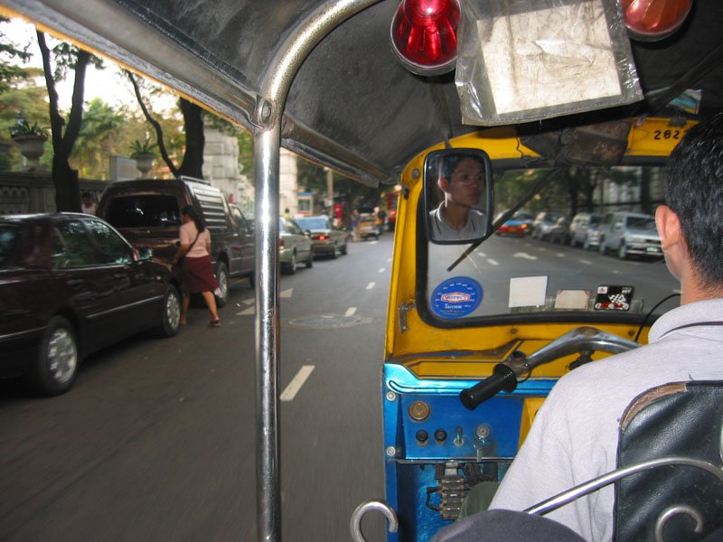 riding in a tuk tuk
