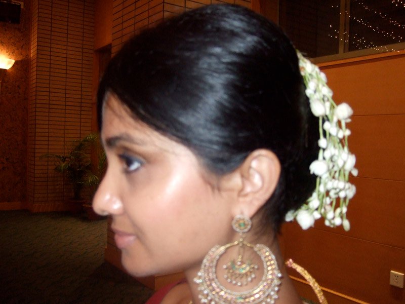 dressed up for one of the endless string of Dhaka weddings.  with jasmine flowers in my hair, and wearing my great-great-great grandmother's (Nawab Faizunnessa's) earrings
