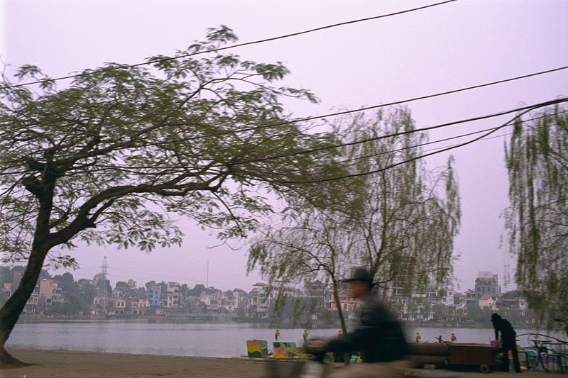 one of the many lakes in hanoi.  hanoi is one of my favourite cities, with its many lakes, willow trees, wide boulevards, old french colonial architecture, the old quarter with its narrow chaotic streets, and even the more modern pastel buildings...
