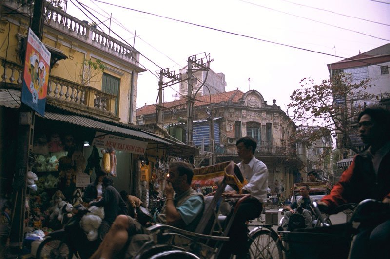rickshaws in the narrow bustling streets of the old quarter
