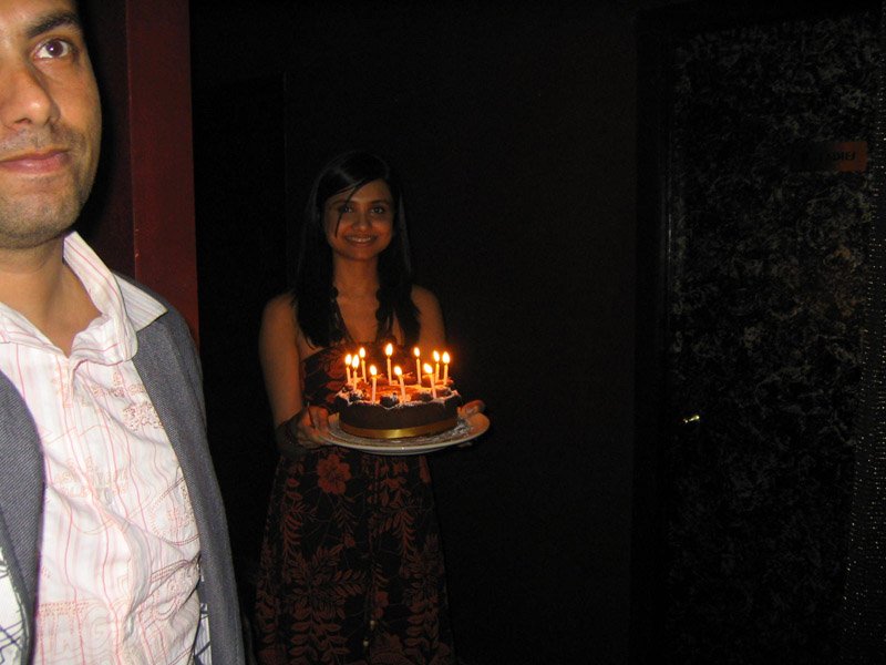 me coming out with Shahrina's cake (that's the owner of Tuts on the side)
